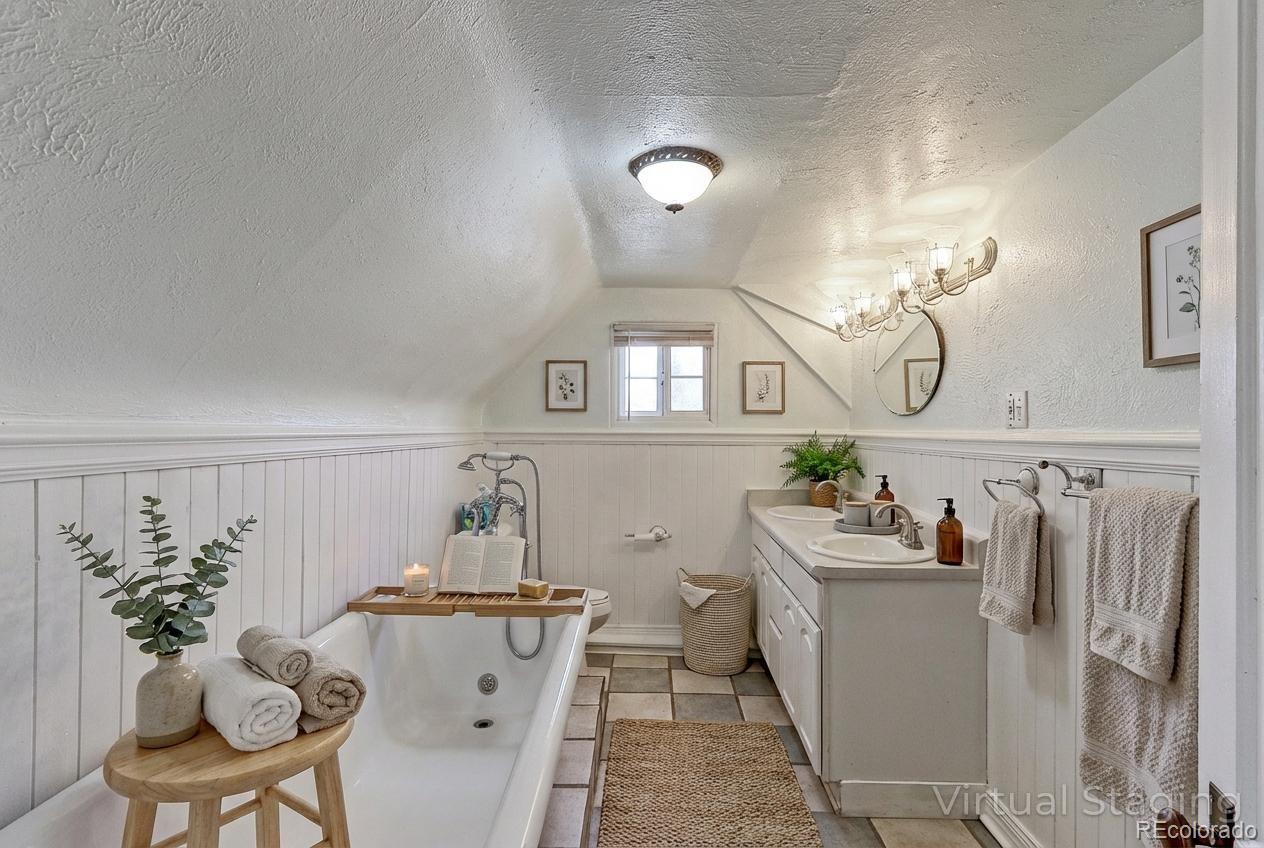 4576 Stuart Street Denver, CO 80212 - Photo 21 of 43 a very nice looking dining room with a table and chairs in it