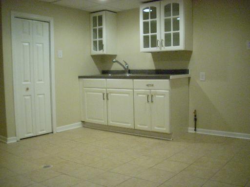307 East Harrison Road Lombard, IL 60148 - Photo 12 of 16 a bathroom with a granite countertop sink and a window