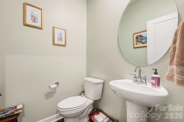 a bathroom with a toilet and a sink