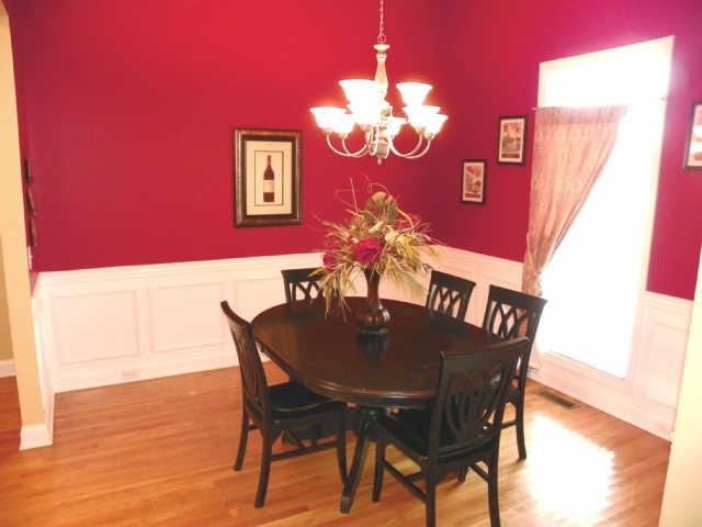 708 Heritage Road Lebanon, TN 37087 - Photo 4 of 15 a view of a dining room with furniture and chandelier