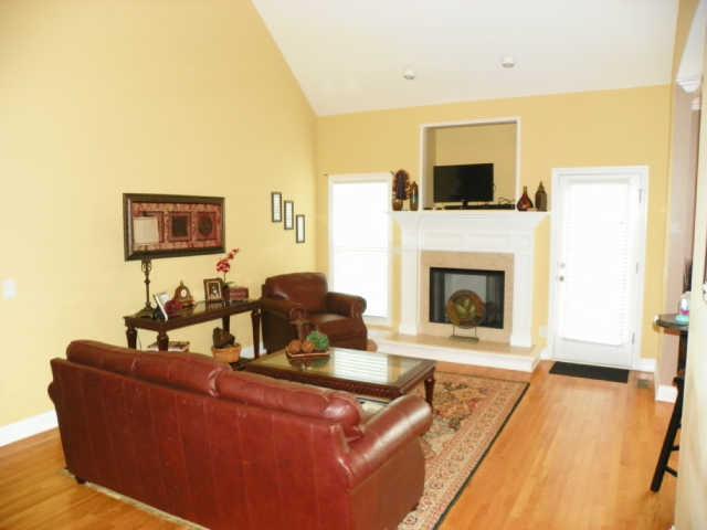 708 Heritage Road Lebanon, TN 37087 - Photo 5 of 15 a living room with furniture and a fireplace