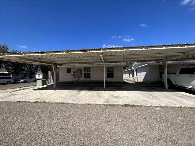 a black and white house with a outdoor space