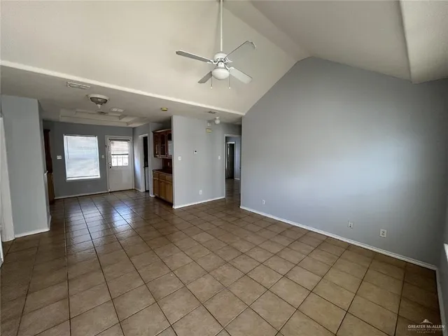a view of an empty room and window
