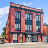 a front view of multi story residential apartment building