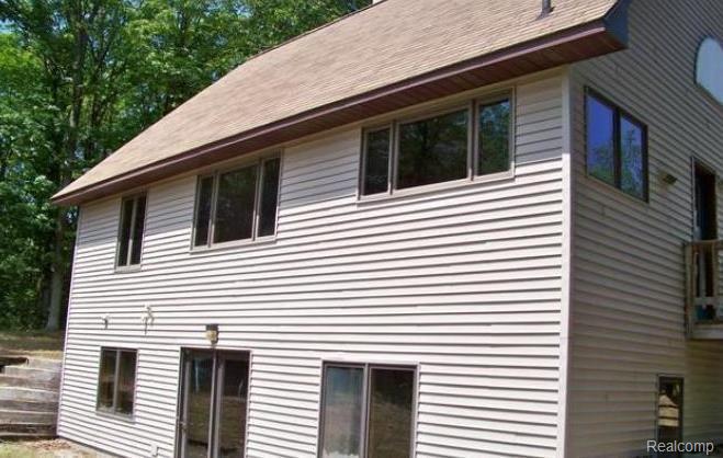 5765 Maidens Road Onekama, MI 49675 - Photo 3 of 4 102164910 Rear view.JPG