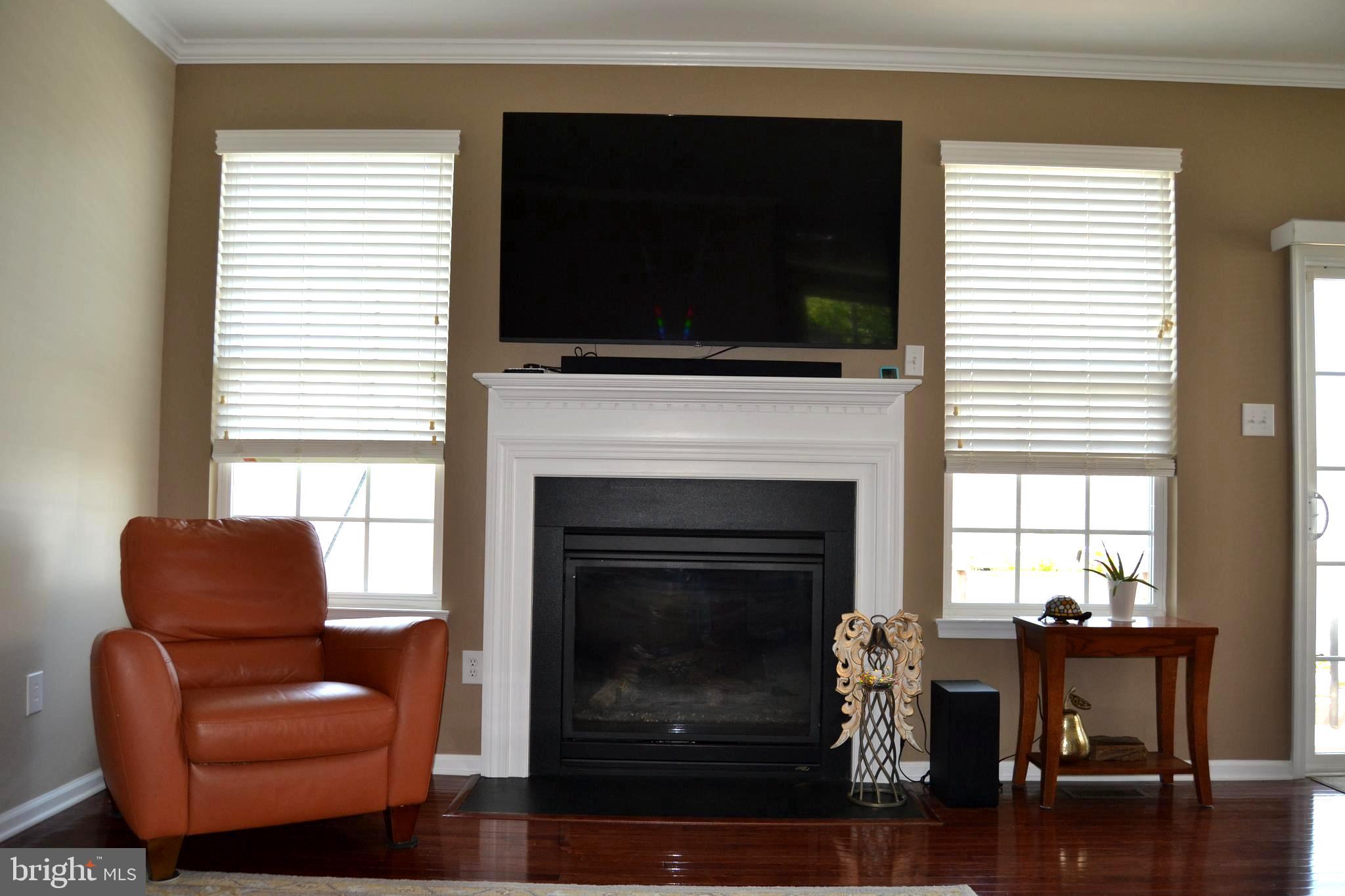 152 Stoyer Road Coatesville, PA 19320 - Photo 14 of 68 Family room with natural gas FP. TV is negotiable