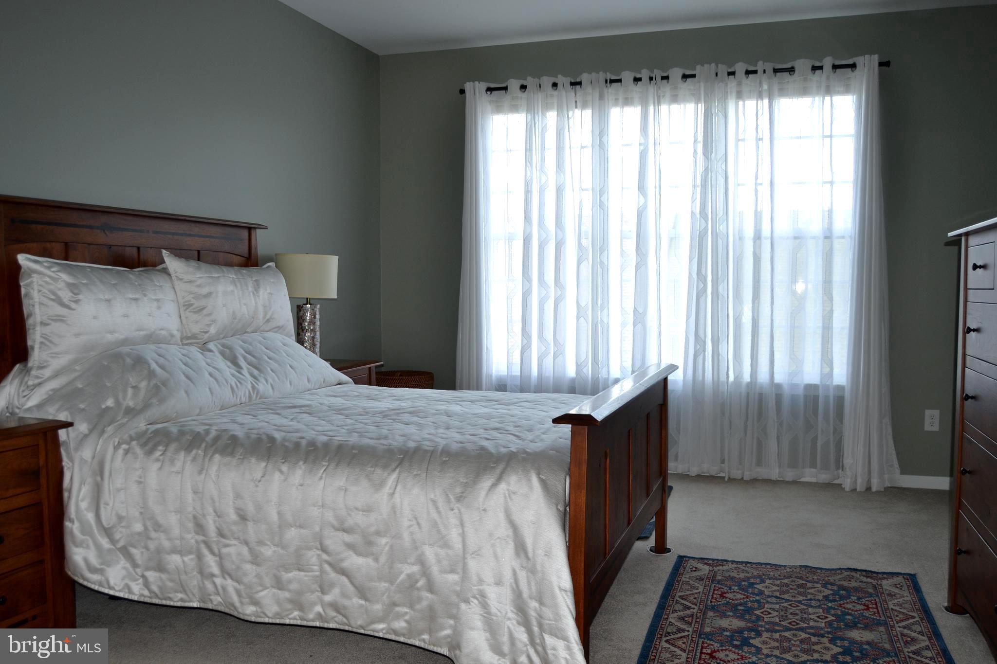 152 Stoyer Road Coatesville, PA 19320 - Photo 18 of 68 Main floor primary bedroom with H/H closets