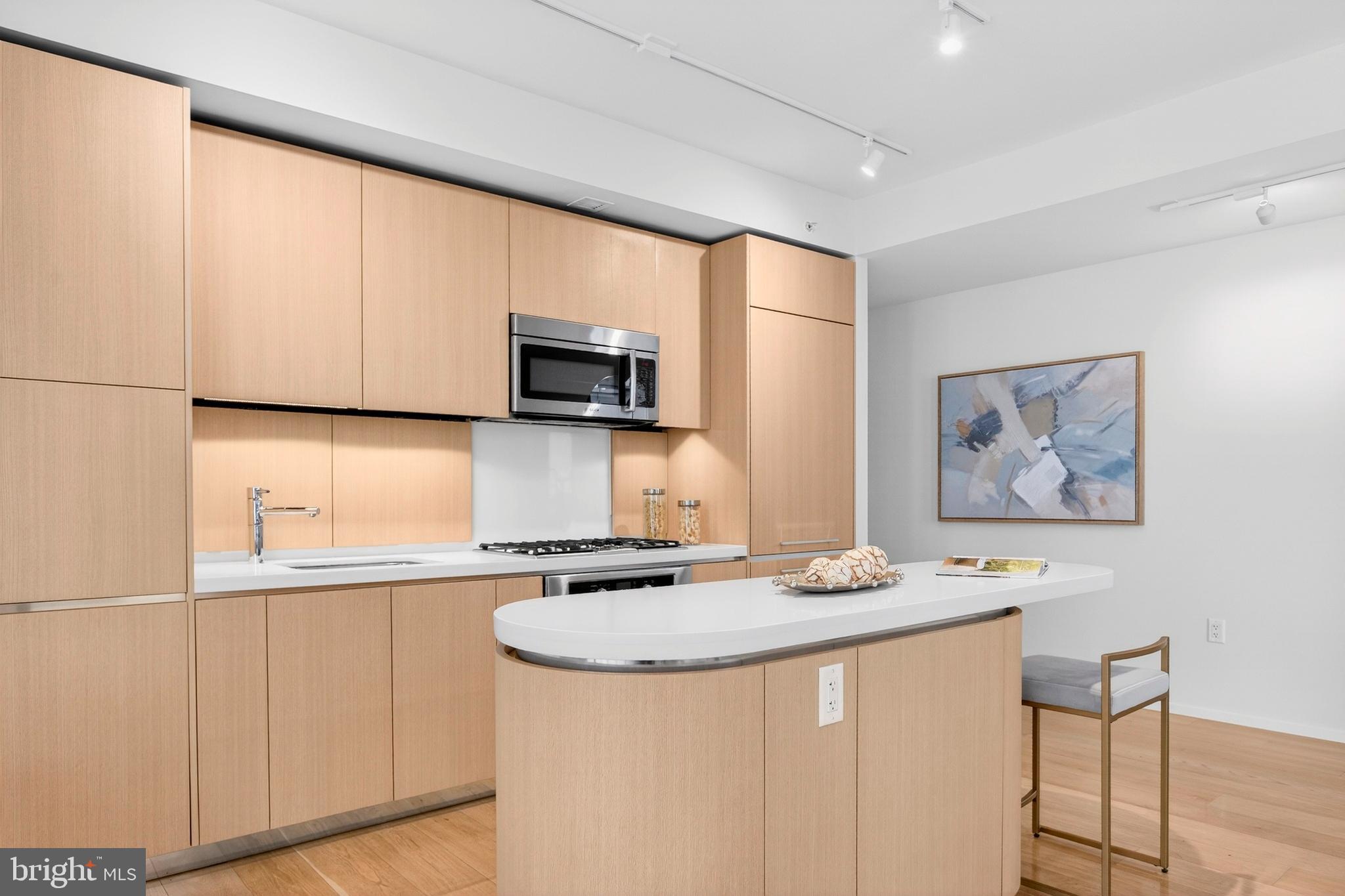 925 H Street Northwest, Unit 515 Washington, DC 20001 - Photo 23 of 57 Well Equipped Kitchen Southwest