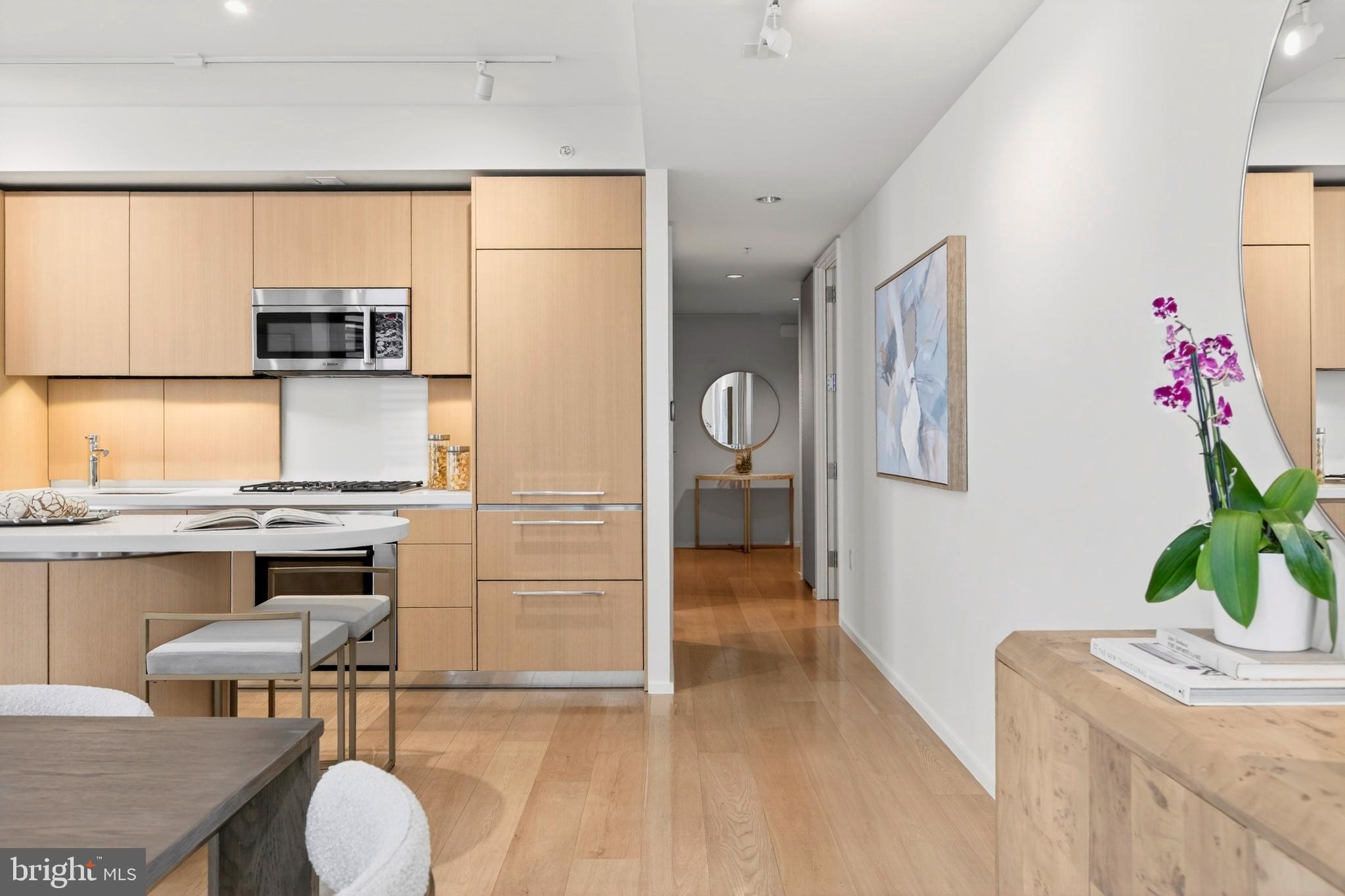 925 H Street Northwest, Unit 515 Washington, DC 20001 - Photo 24 of 57 Dining Area past Kitchen to Primary Hall South