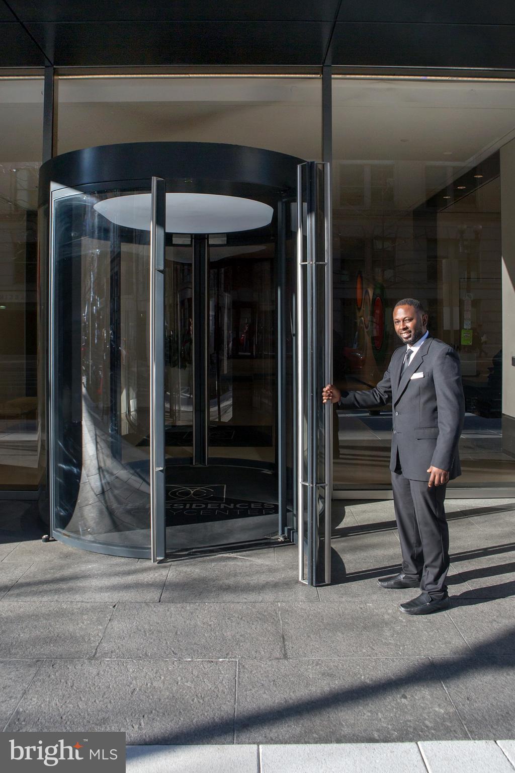 925 H Street Northwest, Unit 515 Washington, DC 20001 - Photo 3 of 57 Doorman at Building Entry to 925 H Street, NW