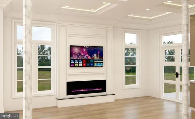 a living room with fireplace and a fireplace