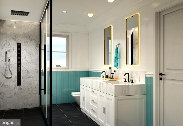 a bathroom with a double vanity sink toilet and shower