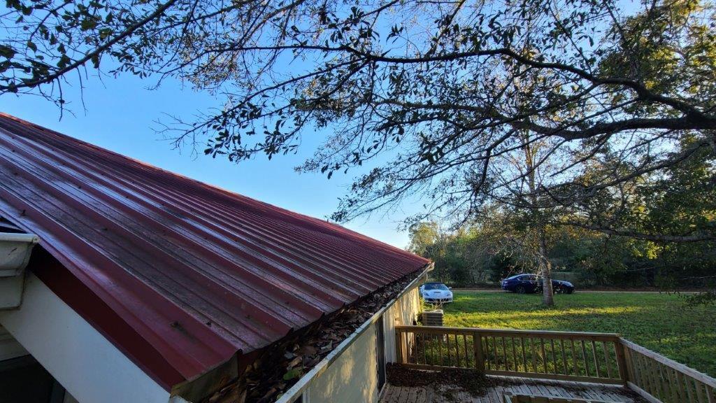 1155 Shady Grove Church Road Baker, FL 32531 - Photo 101 of 113 a backyard of a house with a garden and deck