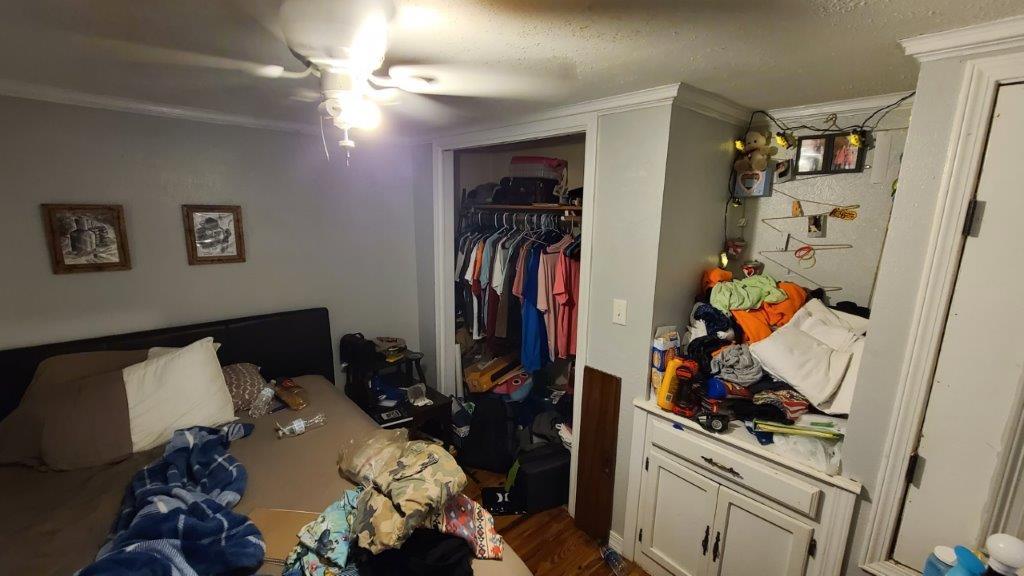 1155 Shady Grove Church Road Baker, FL 32531 - Photo 43 of 113 a view of walk in closet with clothes and shoes