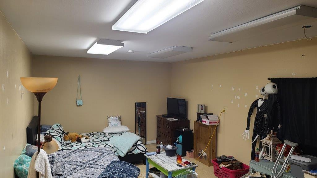 1155 Shady Grove Church Road Baker, FL 32531 - Photo 75 of 113 a bedroom with bed and a flat tv screen on the dresser