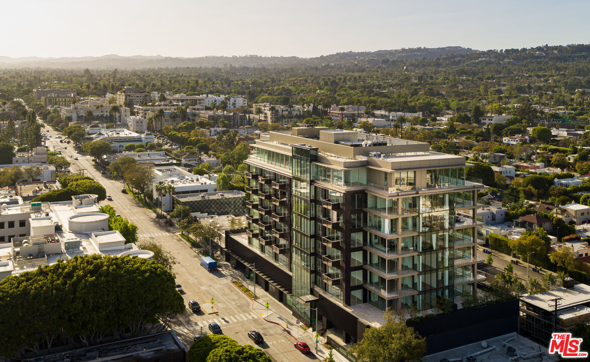 8899 Beverly Boulevard, Unit 6G Los Angeles, CA 90048 - Photo 25 of 25 an aerial view of residential houses with city view