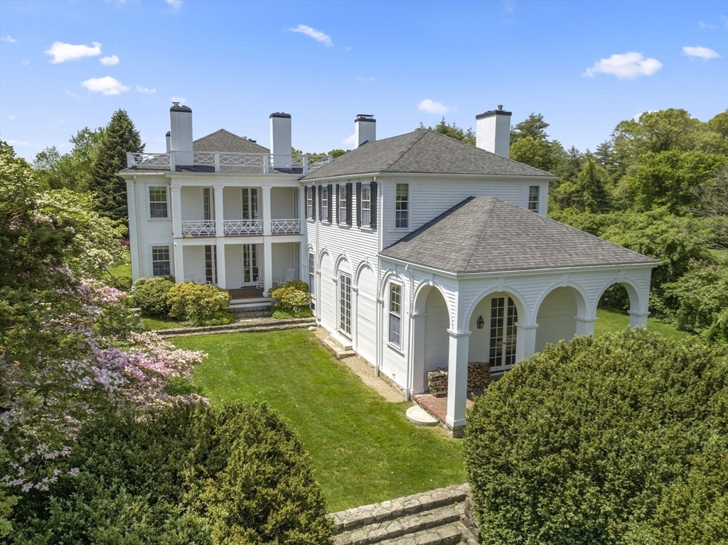 427 Concord Road Sudbury, MA 01776 - Photo 35 of 42 a front view of a house with a yard