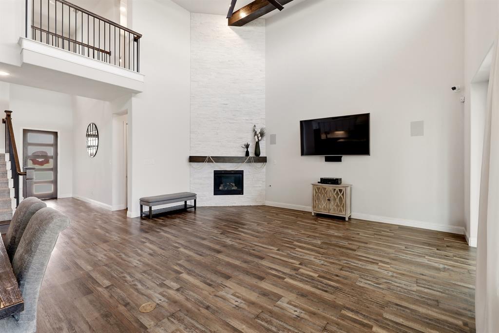 1313 Kirkwood Road Rockwall, TX 75087 - Photo 18 of 39 Stone fireplace, floor to ceiling!