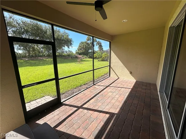 a view of a balcony with wooden floor