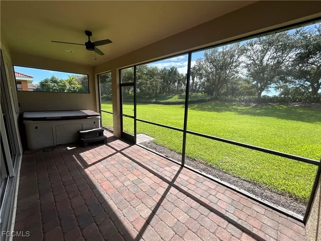 a view of two chairs in the balcony