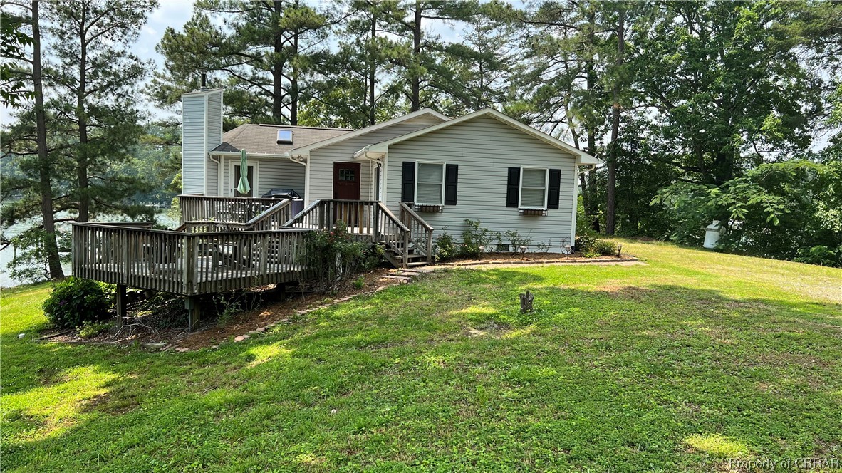 88 Leachwood Road Lancaster, VA 22503 - Photo 2 of 49 a view of a house with a yard and sitting area