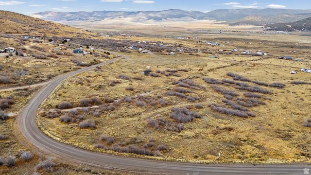 349 West Mountain View Road, Unit 349 Fairview, UT 84629 - Photo 15 of 26 Curving roadway with surrounding open land, featuring distant hills and scattered residential structures