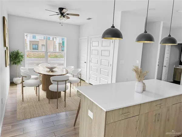 a dining room with furniture and window