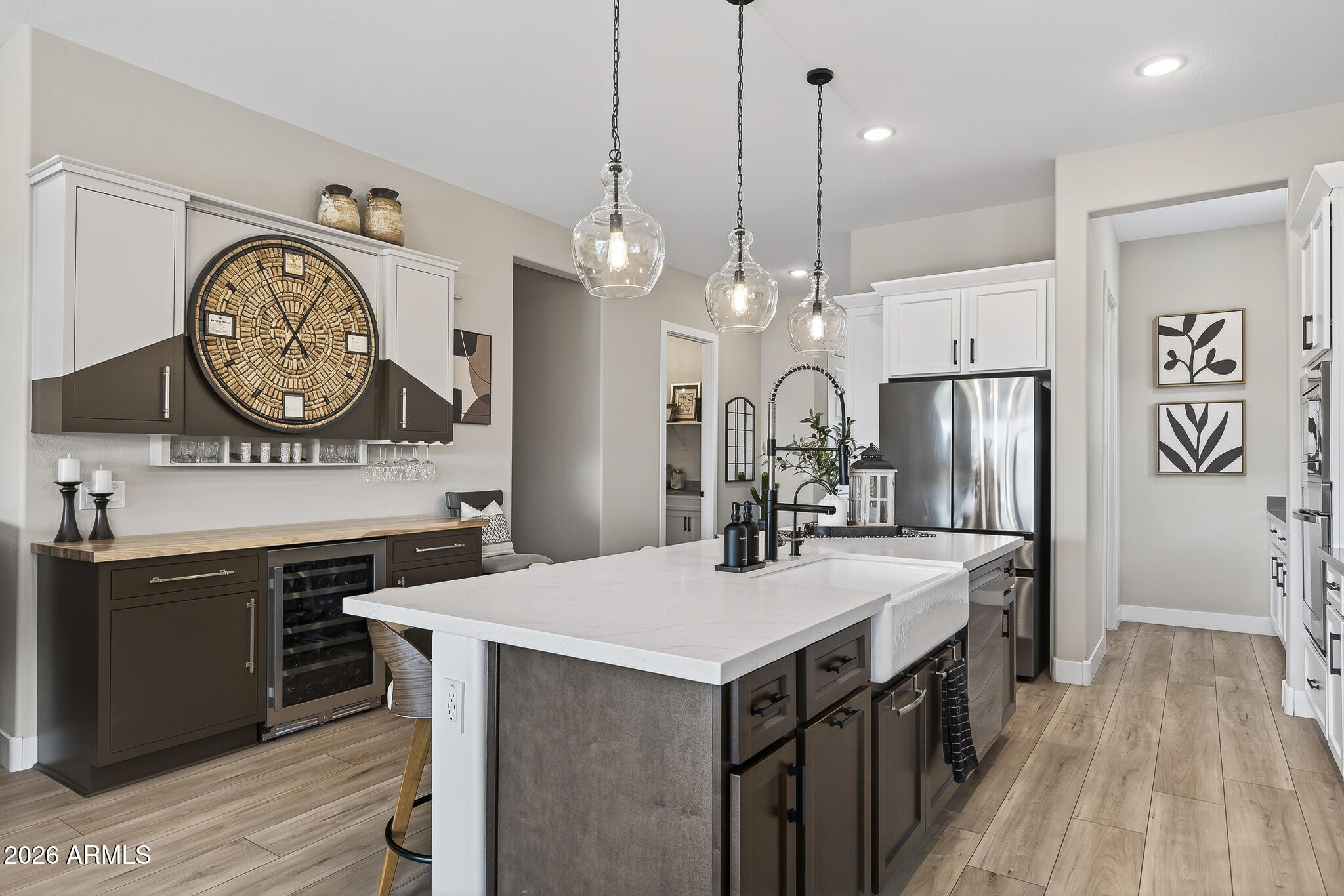 20627 West Rancho Drive Buckeye, AZ 85396 - Photo 10 of 82 a kitchen with a sink a stove and a clock
