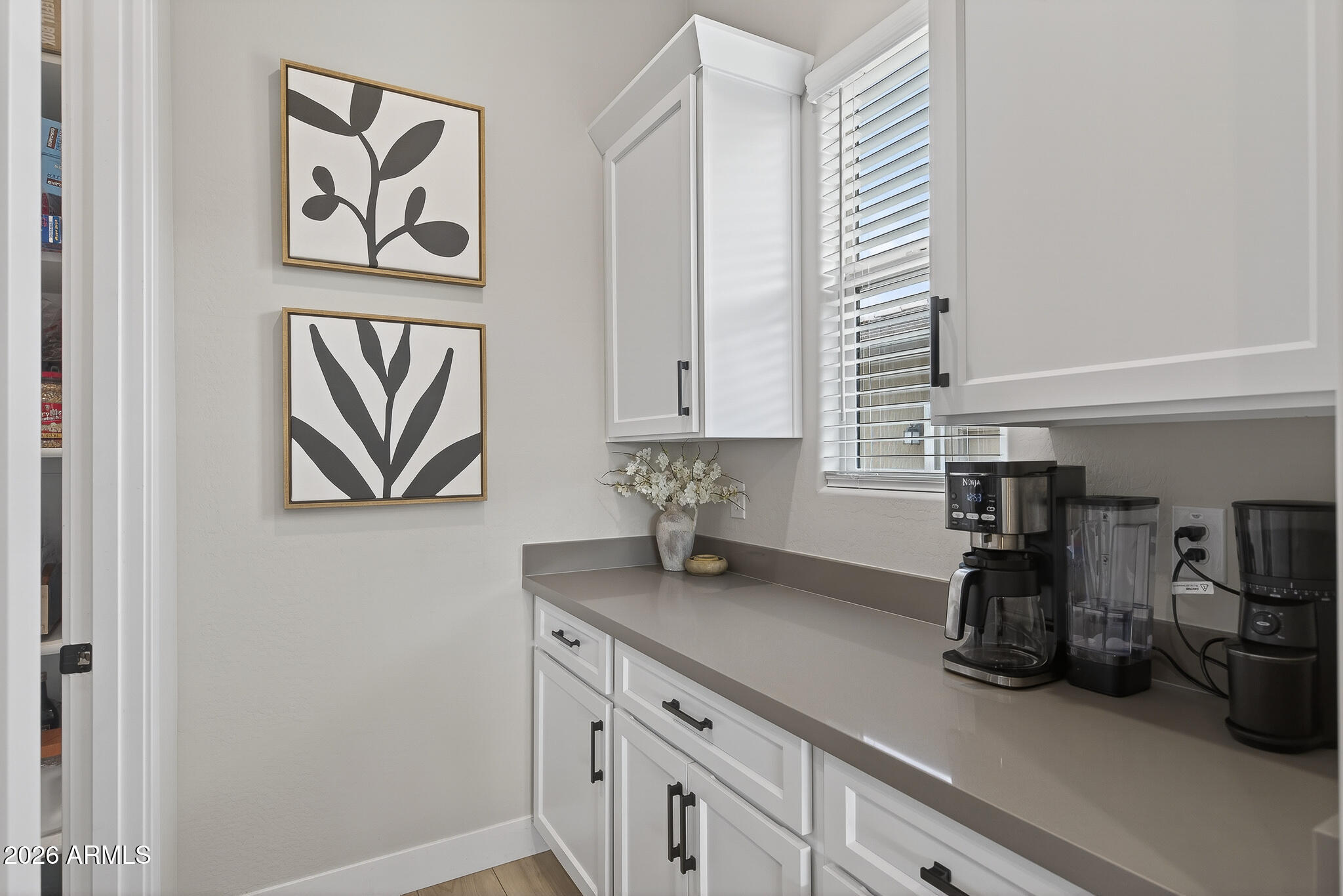 20627 West Rancho Drive Buckeye, AZ 85396 - Photo 14 of 82 a kitchen with a sink and cabinets