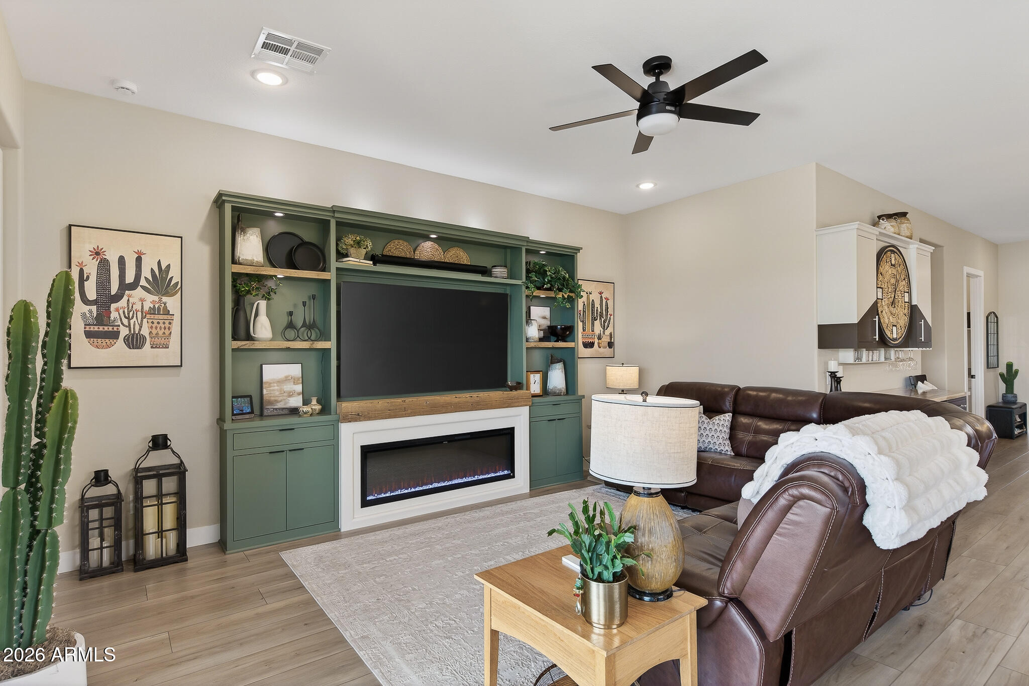 20627 West Rancho Drive Buckeye, AZ 85396 - Photo 17 of 82 a living room with furniture and a fireplace