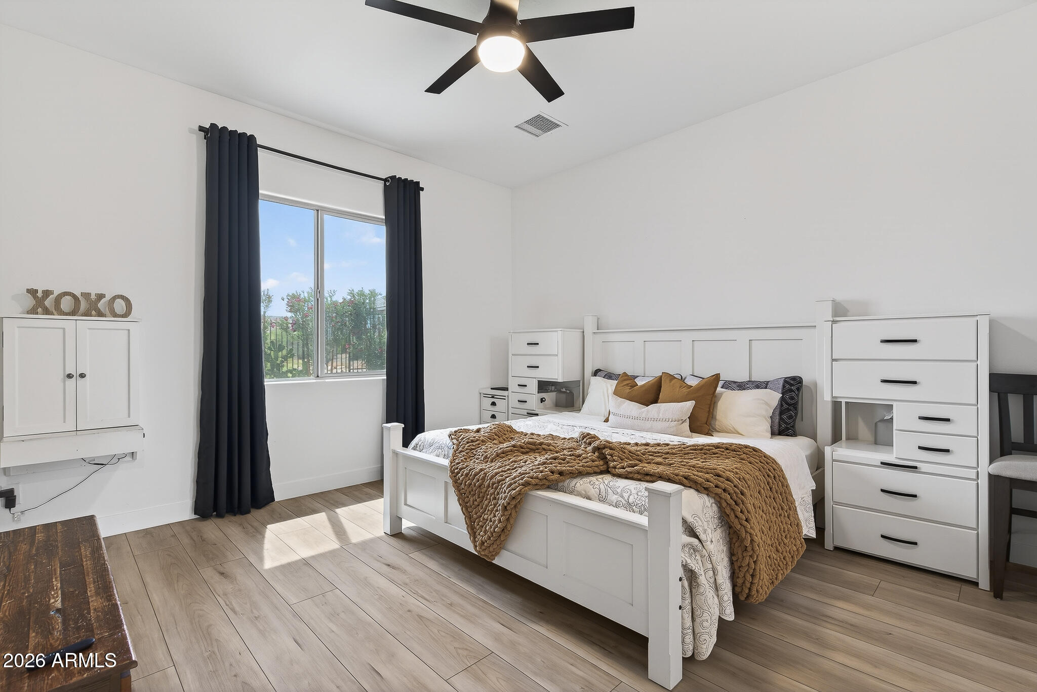 20627 West Rancho Drive Buckeye, AZ 85396 - Photo 20 of 82 a bedroom with a bed and a window