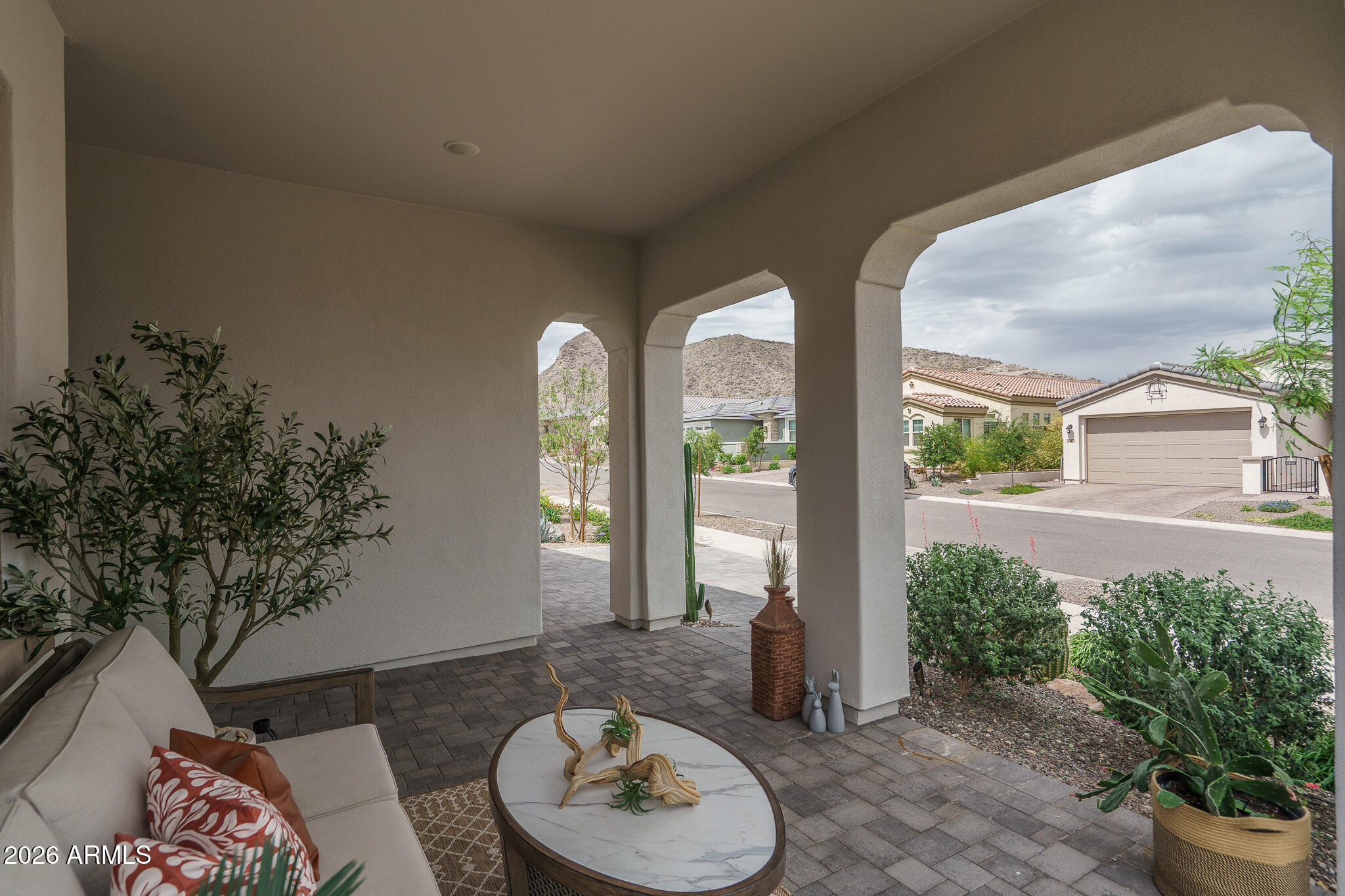 20627 West Rancho Drive Buckeye, AZ 85396 - Photo 5 of 82 a living room with furniture and a potted plant