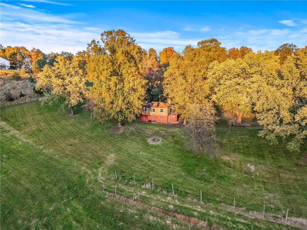 438 Spring Street Extension Mars, PA 16046 - Photo 1 of 13 a view of a lake with a garden