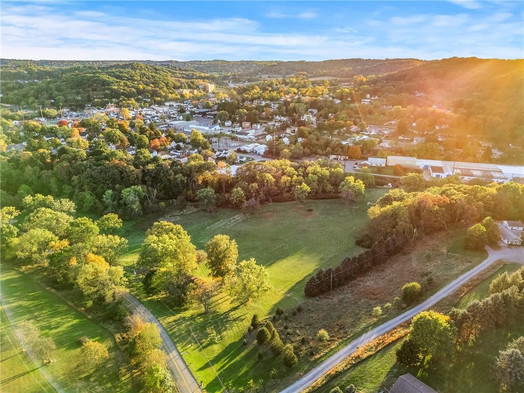 438 Spring Street Extension Mars, PA 16046 - Photo 12 of 13 an aerial view of residential houses with outdoor space and lake view