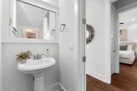 a bathroom with a sink and a mirror