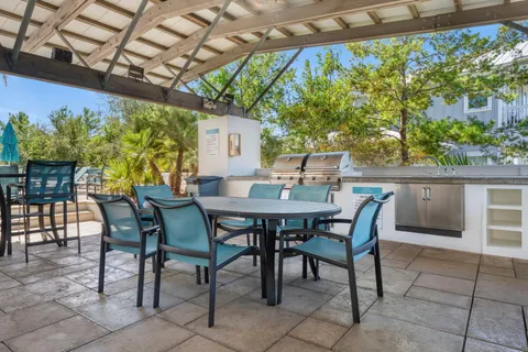 a view of a backyard with palm trees