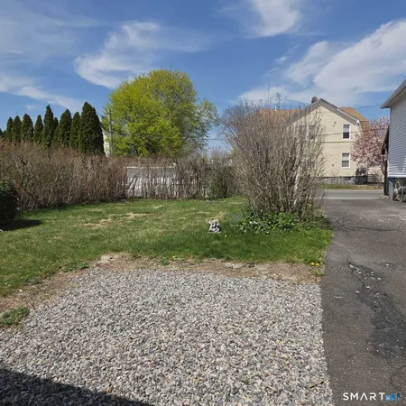 a view of a backyard with a garden