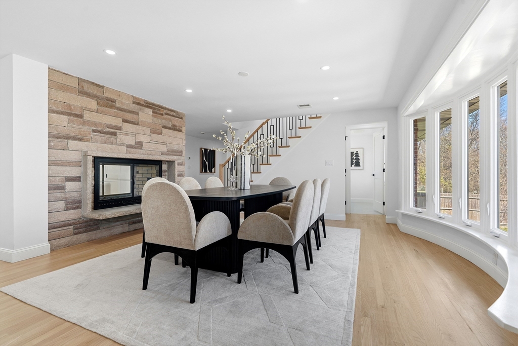 171 Shaw Road Brookline, MA 02467 - Photo 8 of 42 a view of a dining room with furniture window and wooden floor