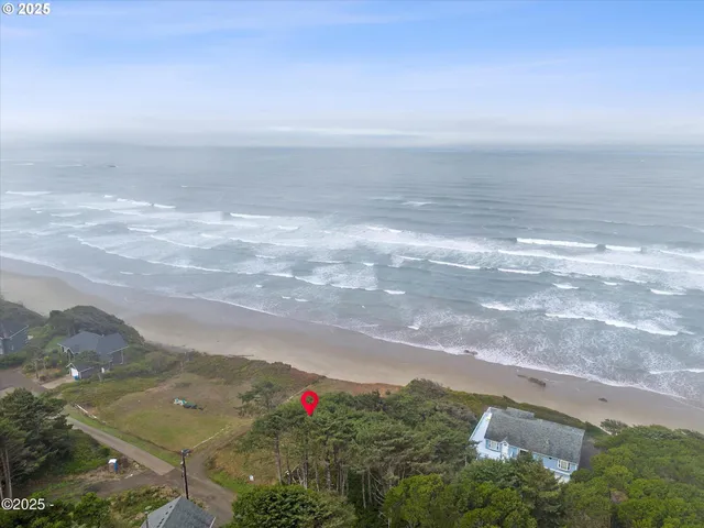 a view of a road with mountains in the background