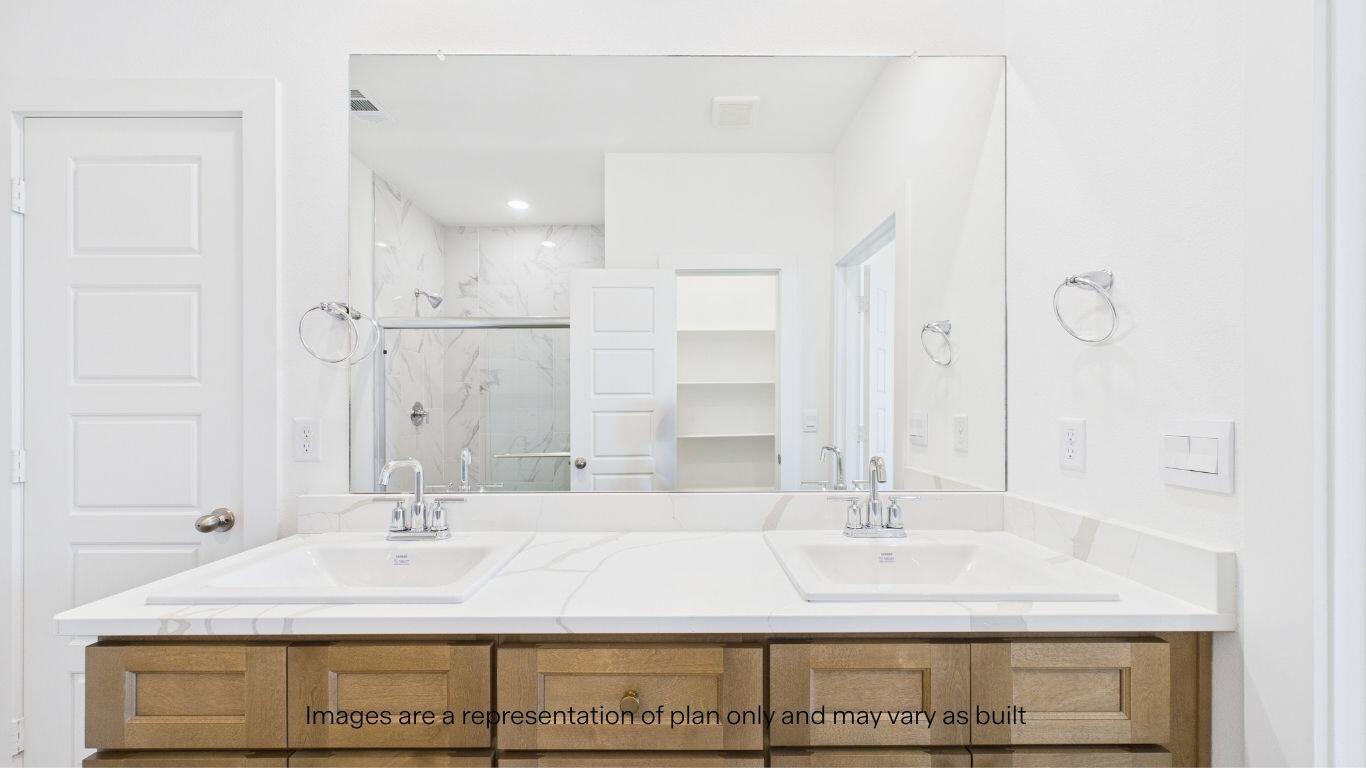 2812 134th Street Lubbock, TX 79423 - Photo 18 of 36 a bathroom with a sink and a mirror