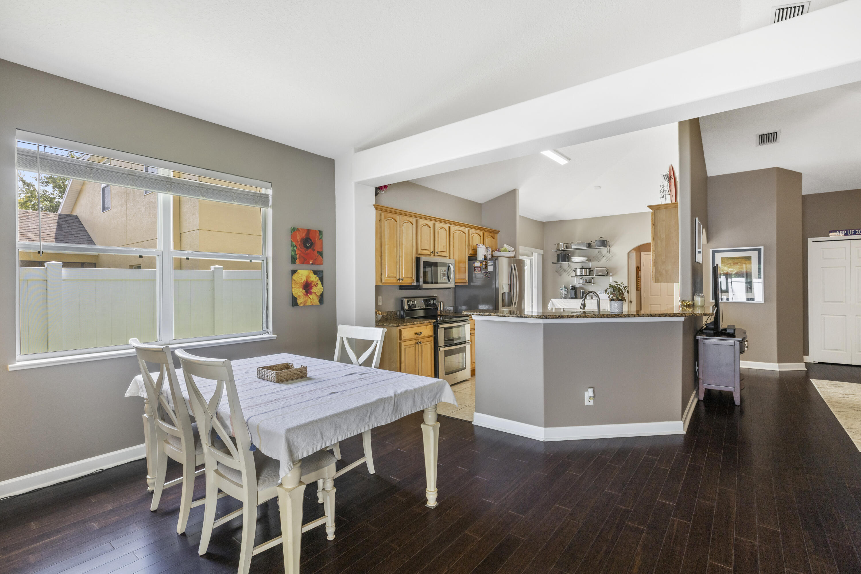 110 Briarcliff Circle Sebastian, FL 32958 - Photo 15 of 42 a view of a dining room with furniture and wooden floor