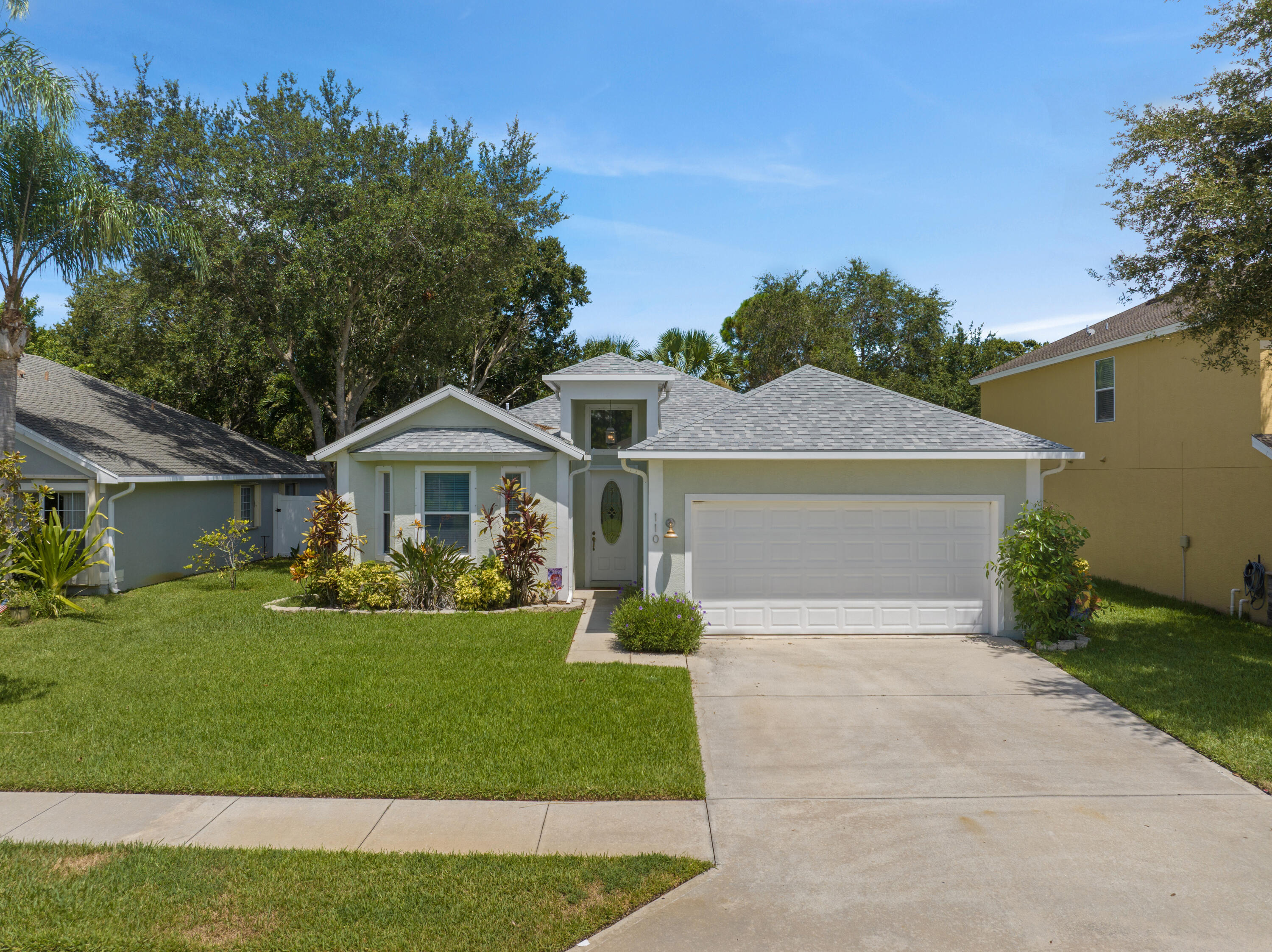 110 Briarcliff Circle Sebastian, FL 32958 - Photo 2 of 42 a front view of a house with a yard