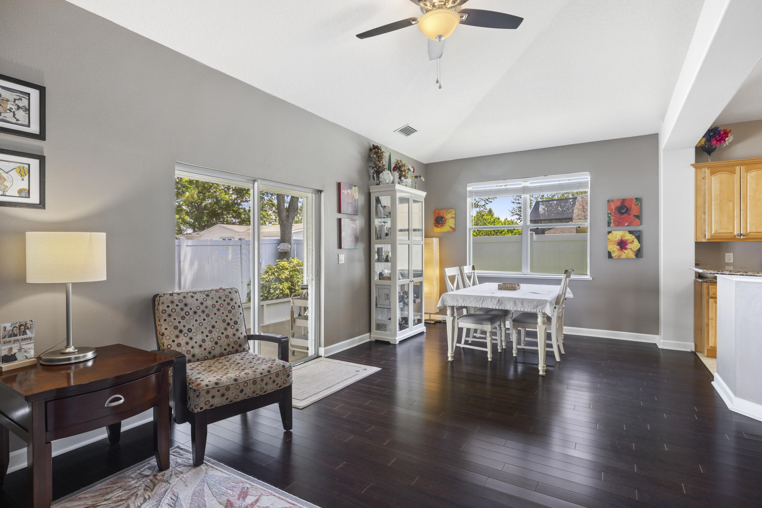 110 Briarcliff Circle Sebastian, FL 32958 - Photo 21 of 42 a living room with furniture wooden floor and a window