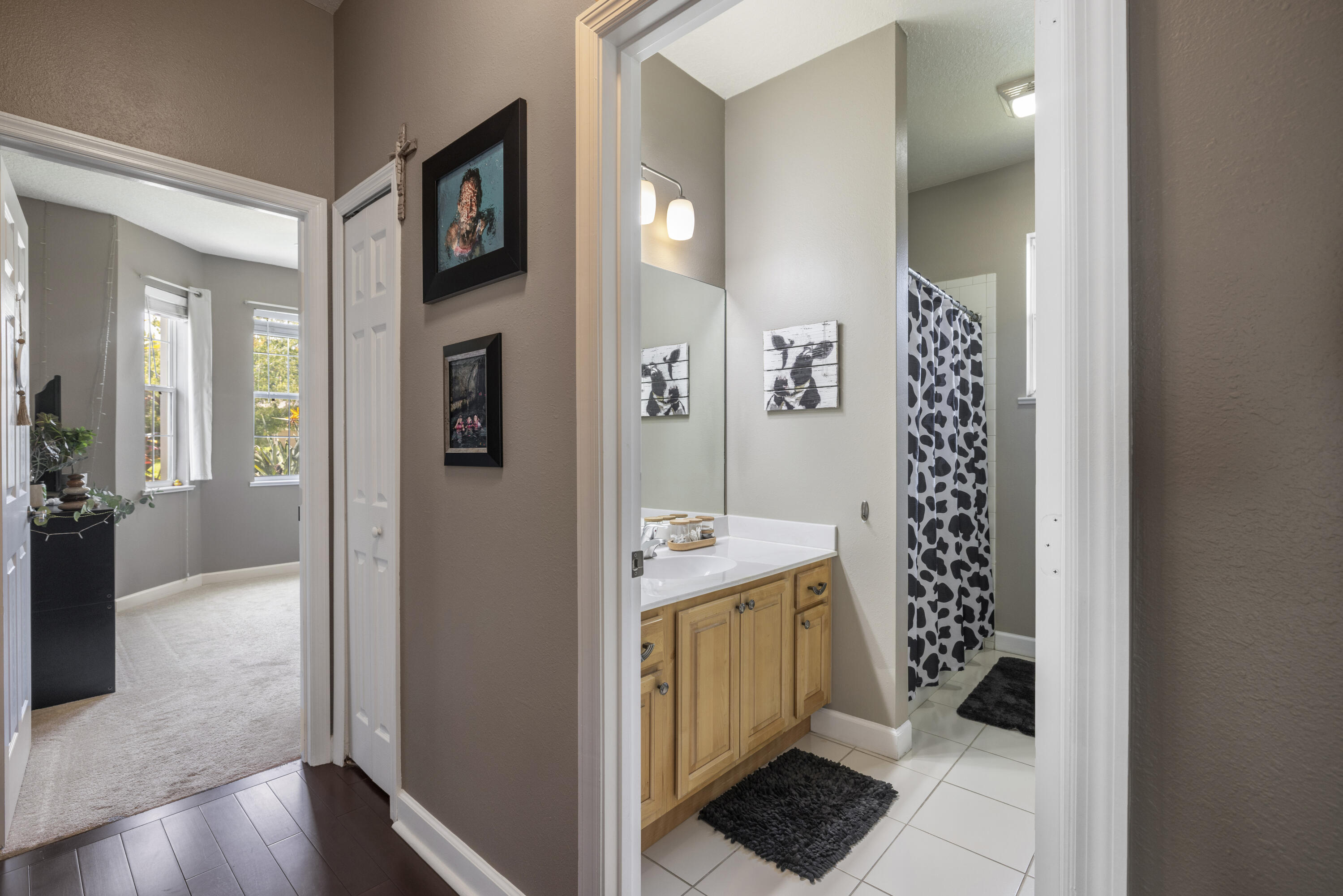 110 Briarcliff Circle Sebastian, FL 32958 - Photo 26 of 42 a view of a hallway view with wooden floor and living space with furniture