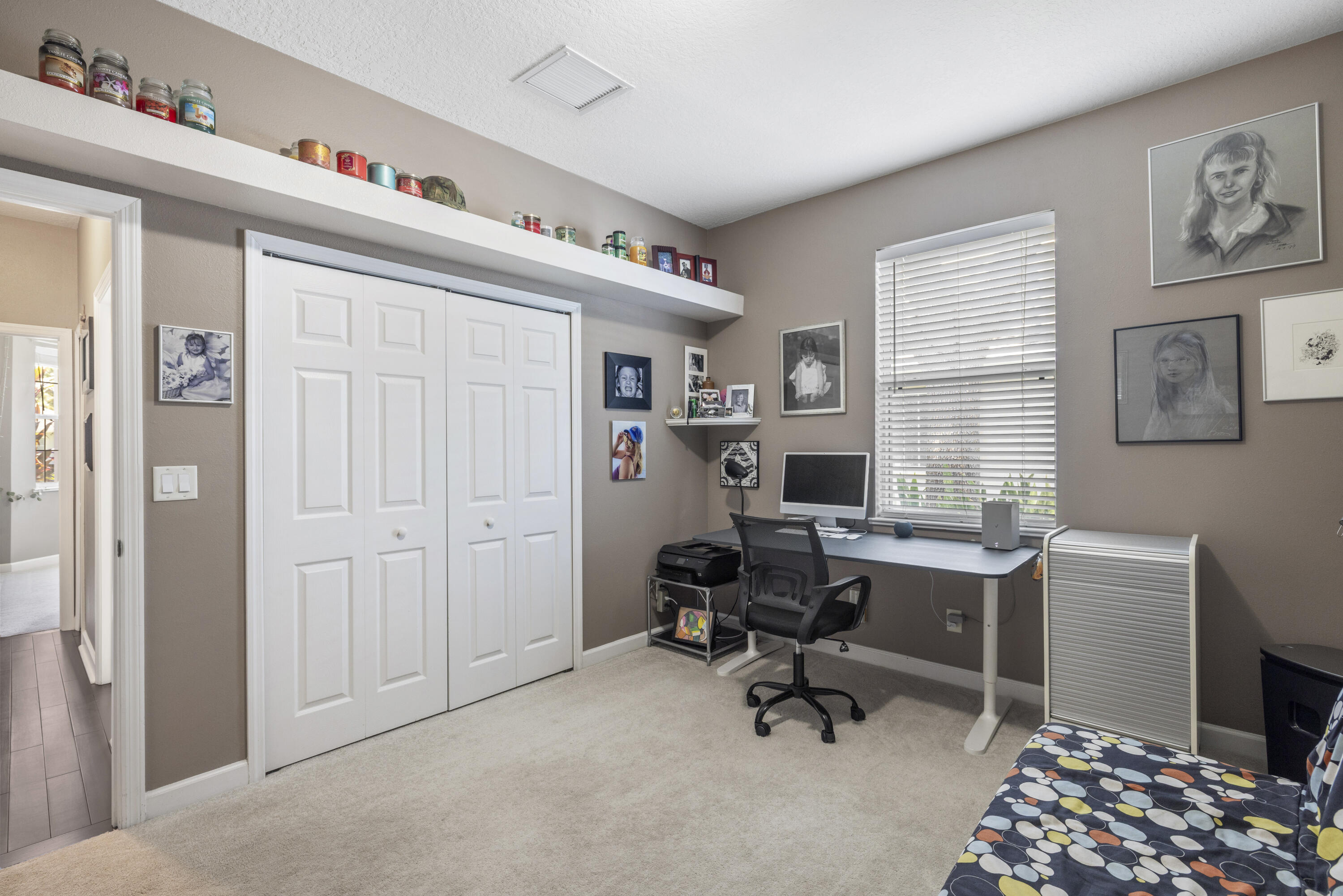 110 Briarcliff Circle Sebastian, FL 32958 - Photo 31 of 42 a view of a workspace with furniture and a window