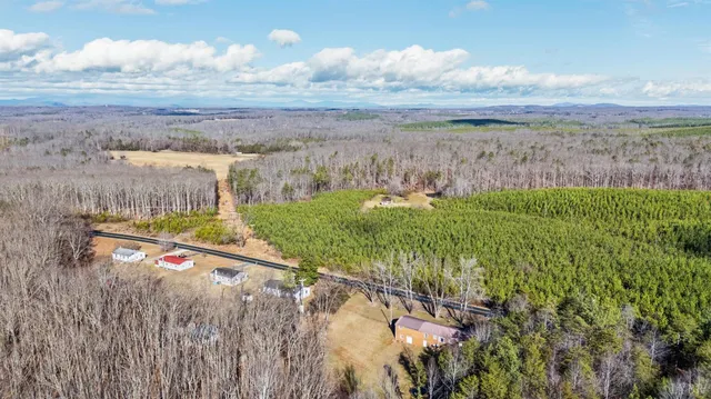 a view of a street with an ocean view