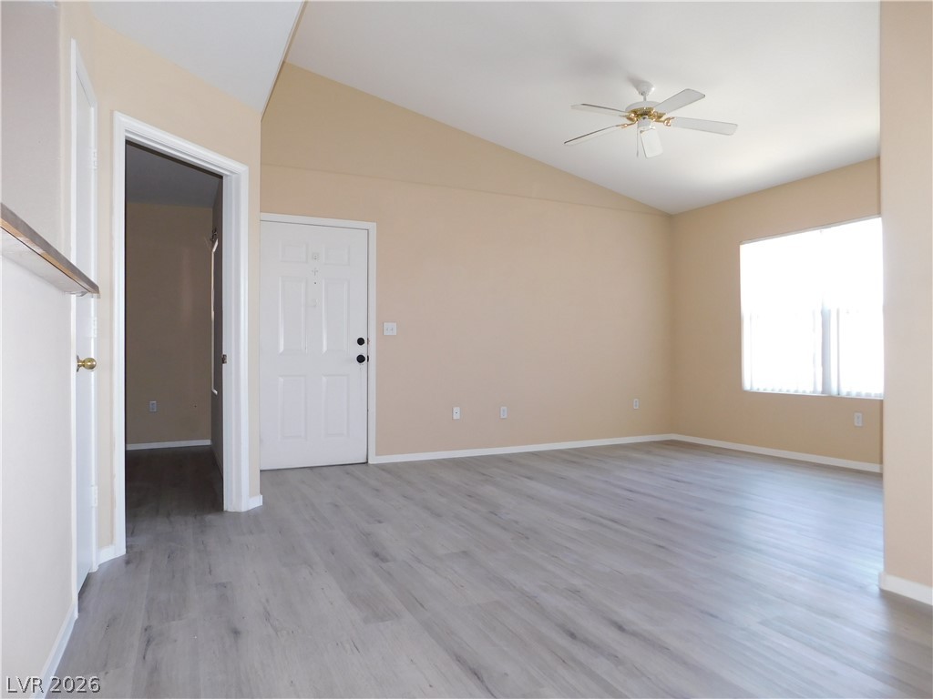 7255 West Sunset Road, Unit 2029 Las Vegas, NV 89113 - Photo 2 of 21 This generous living space features vaulted ceilings and light wood-look flooring.