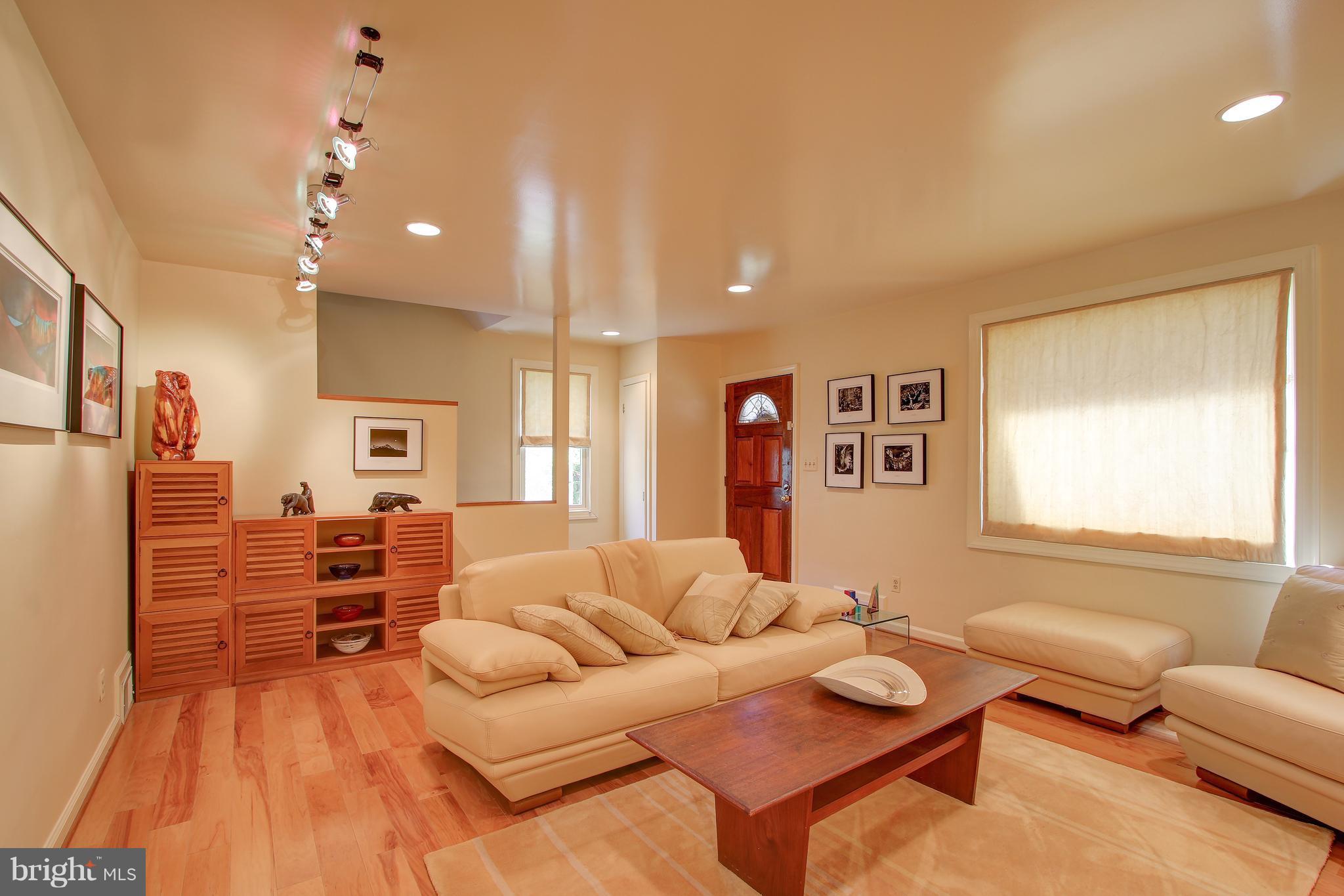 141 Ritchie Avenue Silver Spring, MD 20910 - Photo 5 of 30 invites you to a gallery-like living room
