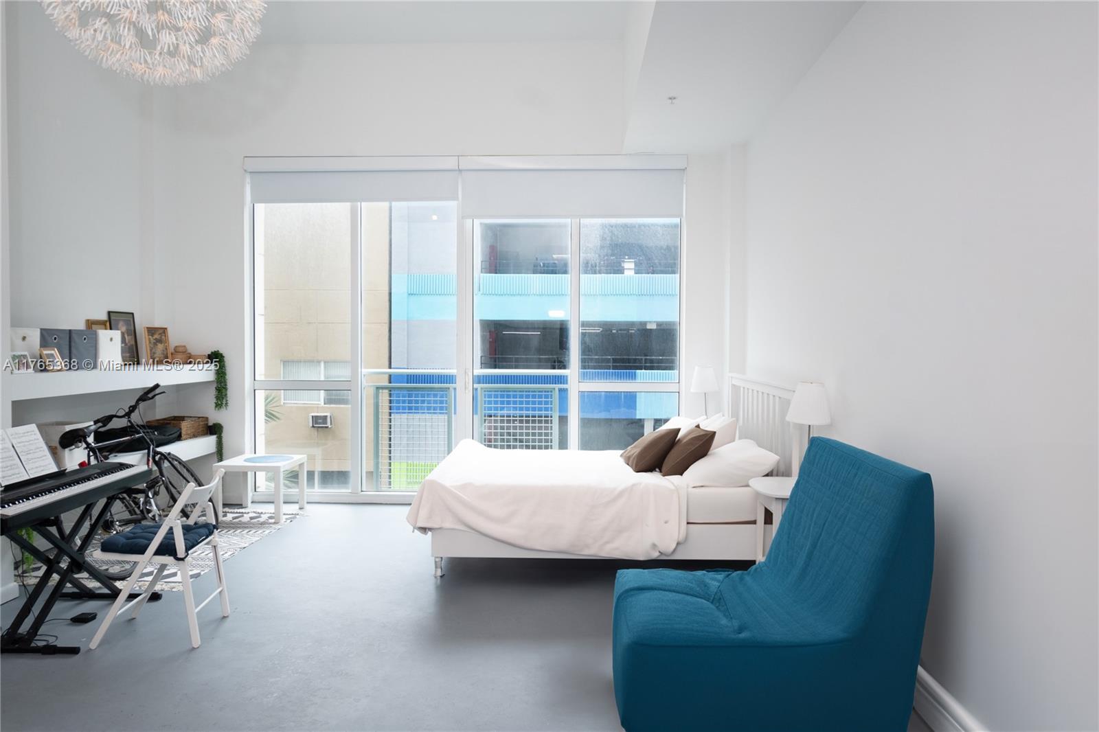 Miami Central Business District Miami, FL 33132 - Photo 1 of 23 a living room with furniture and a large window