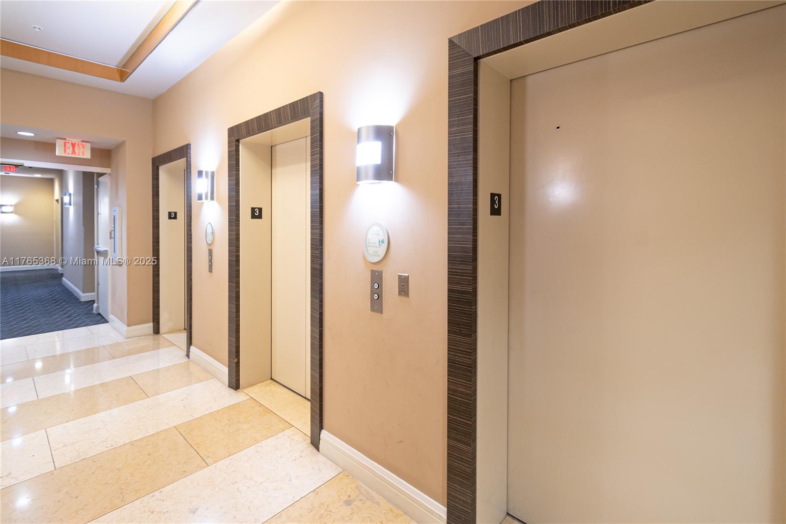Miami Central Business District Miami, FL 33132 - Photo 11 of 23 a view of a bathroom from a hallway